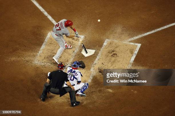 Mike Trout of the Los Angeles Angels of Anaheim and the American League hits a solo home run in the third inning against the National League during...