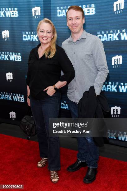 Lori Denil and Guest attend the premiere of Blumhouse Productions and Universal Pictures' "Unfriended: Dark Web" at L.A. LIVE on July 17, 2018 in Los...