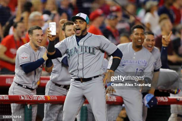 Nelson Cruz of the Seattle Mariners reacts to to a Jean Segura of the Seattle Mariners home run during the the 89th MLB All-Star Game at Nationals...