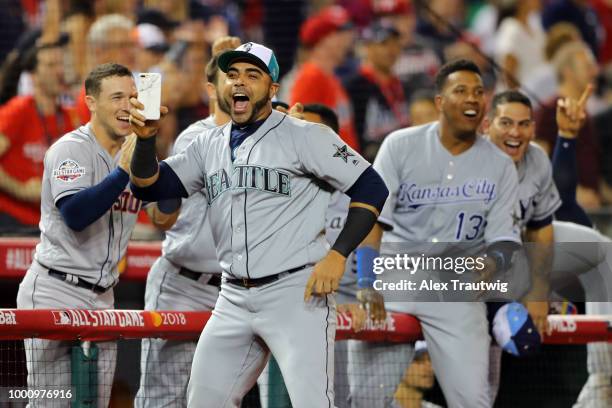 Nelson Cruz of the Seattle Mariners reacts to to a Jean Segura of the Seattle Mariners home run during the the 89th MLB All-Star Game at Nationals...