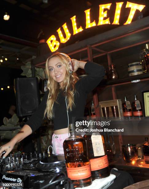 Brandi Cyrus spins at the Bulleit Bourbon Tattoo Edition launch on July 17, 2018 in Los Angeles, California.