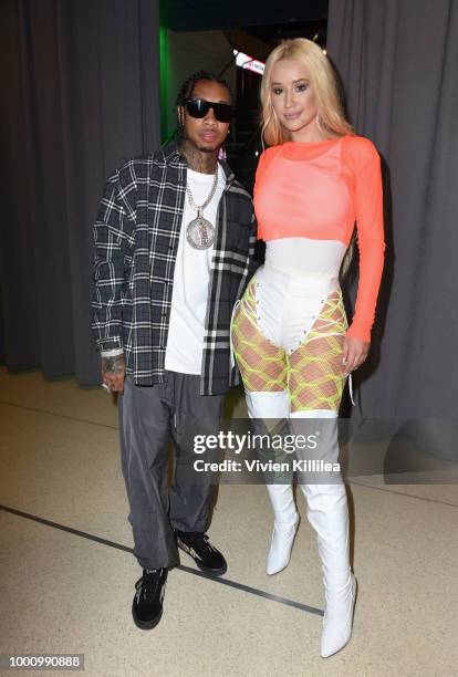 Tyga and Iggy Azalea backstage at 50K Charity Challenge Celebrity Basketball Game at UCLA's Pauley Pavilion on July 17, 2018 in Westwood, California.