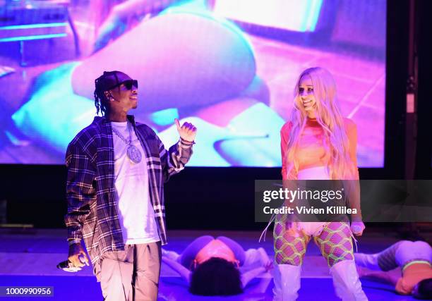 Tyga and Iggy Azalea perform at 50K Charity Challenge Celebrity Basketball Game at UCLA's Pauley Pavilion on July 17, 2018 in Westwood, California.