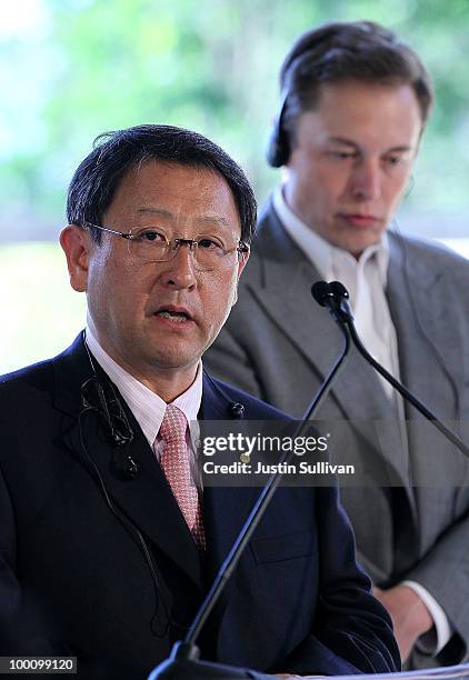 Tesla Motors CEO Elon Musk looks on as Toyota CEO Akio Toyoda speaks during a news conference at Tesla Motors headquarters May 20, 2010 in Palo Alto,...