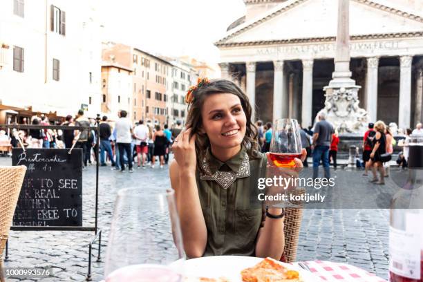happy woman in a restaurant - open air dining stock pictures, royalty-free photos & images