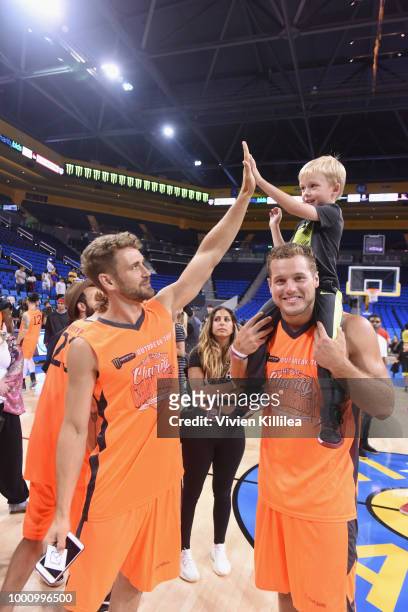 Nick Viall, Buster Douglas, and Colton Underwood attend 50K Charity Challenge Celebrity Basketball Game at UCLA's Pauley Pavilion on July 17, 2018 in...