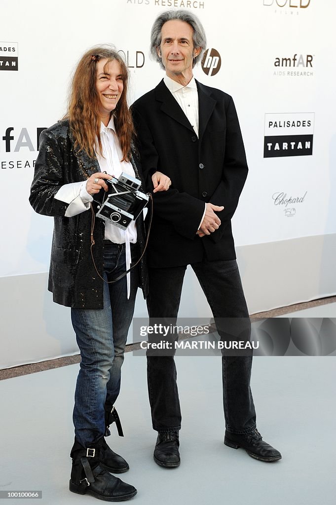 US singer Patti Smith arrives at amfAR's