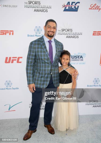 Roman Reigns and daughter attend the 4th Annual Sports Humanitarian Awards at The Novo by Microsoft on July 17, 2018 in Los Angeles, California.