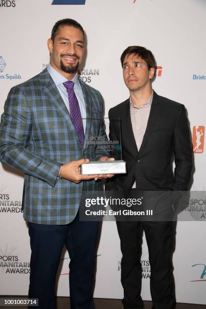 Roman Reigns and Justin Long attend the 4th Annual Sports Humanitarian Awards at The Novo by Microsoft on July 17, 2018 in Los Angeles, California.