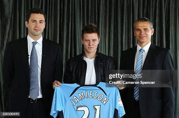 Sydney FC vice-chairman Scott Barlow, Scott Jamieson of Sydney FC and coach Vitezslav Lavicka pose during a Sydney FC A-League press conference...