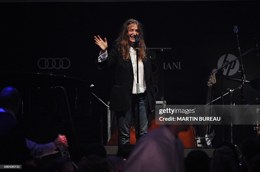 US singer Patti Smith performs at amfAR'