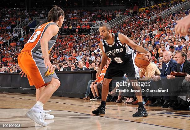 Tony Parker of the San Antonio Spurs looks to move against Steve Nash of the Phoenix Suns in Game Two of the Western Conference Semifinals during the...