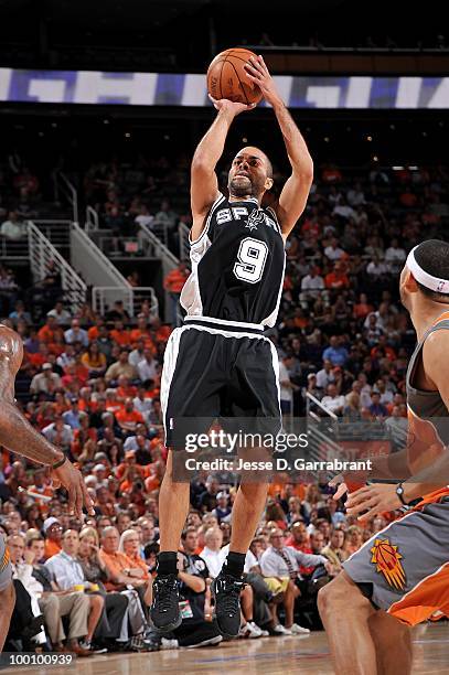 Tony Parker of the San Antonio Spurs takes a jump shot while taking on the Phoenix Suns in Game Two of the Western Conference Semifinals during the...