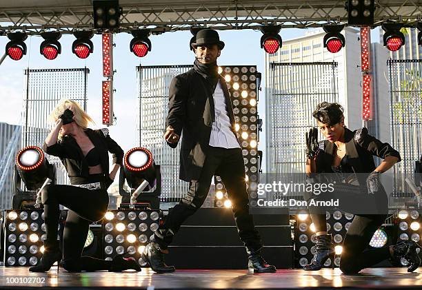 Usher performs live for Seven's "Sunrise" program at the Overseas Passenger Terminal on May 21, 2010 in Sydney, Australia.