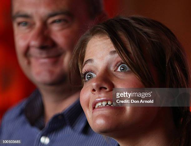 Sailor Jessica Watson speaks to the media as father Roger Watson looks on at a media conference held by her around the world voyage sponsors at The...
