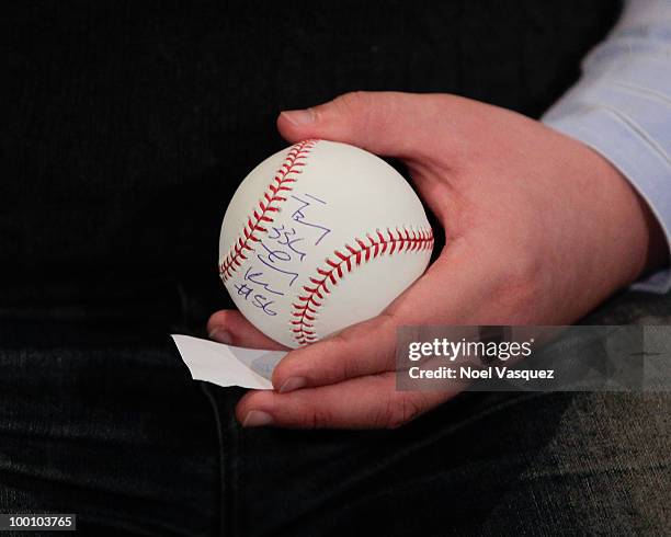 Gifts are exchanged at the Los Angeles Dodger's news conference announcing partnership with Taiwan Tourism Board on May 20, 2010 in Los Angeles,...