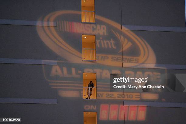 Lights up the building as an on looker watches the group Switchfoot perform during the Rev'UP concert on May 20 in Charlotte, North Carolina.