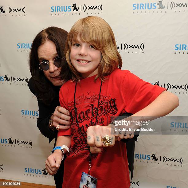 Musician Ozzy Osbourne and Cooper Boyd appear at SIRIUS XM Studios during a promotional event for Osbourne's new album "Scream" on May 20, 2010 in...