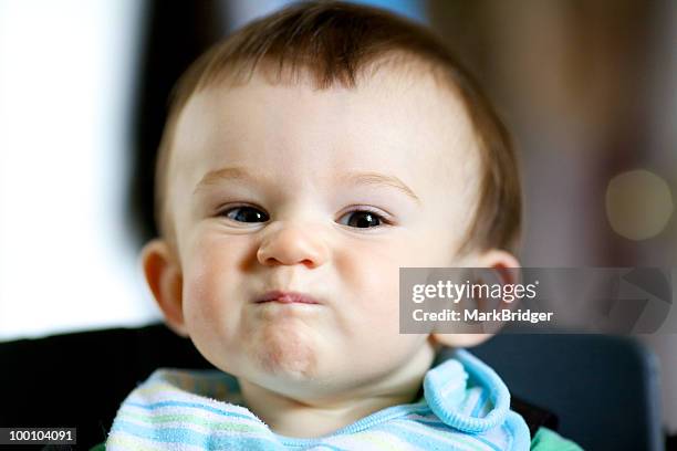 grumpy george - grumpy baby stock pictures, royalty-free photos & images