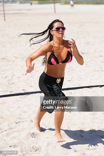 Jenni 'J Wow' Farley is seen playing volleyball on May 20, 2010 in Miami Beach, Florida.