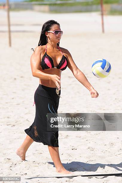 Jenni 'J Wow' Farley is seen playing volleyball on May 20, 2010 in Miami Beach, Florida.