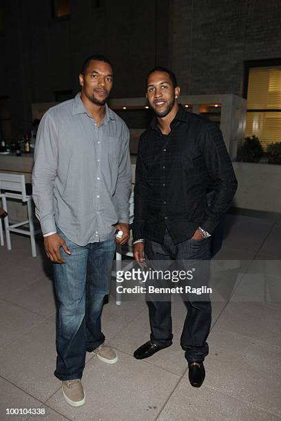 Gerris Wilkinson of the New York Giants and Terrell Thomas of the New York Giants attend The Beacon Condominiums Celebrates the Spring Issue Of...