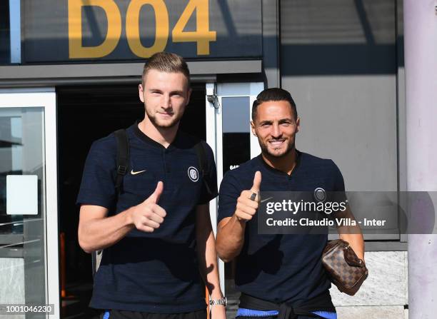 Milan Skriniar and Danilo D'Ambrosio of FC Internazionale depart to Sion at Malpensa Airport on July 18, 2018 in Varese, Italy.