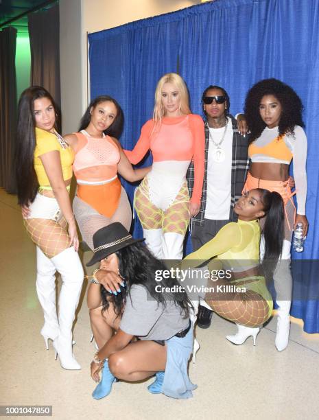 Iggy Azalea, Tyga, Oththan Burnside and dancers attend Monster Energy Outbreak Presents $50K Charity Challenge Celebrity Basketball Game at UCLA's...