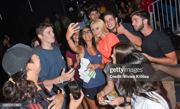 Iggy Azalea and fans at Monster Energy Outbreak Presents $50K Charity Challenge Celebrity Basketball Game at UCLA's Pauley Pavilion on July 17, 2018...