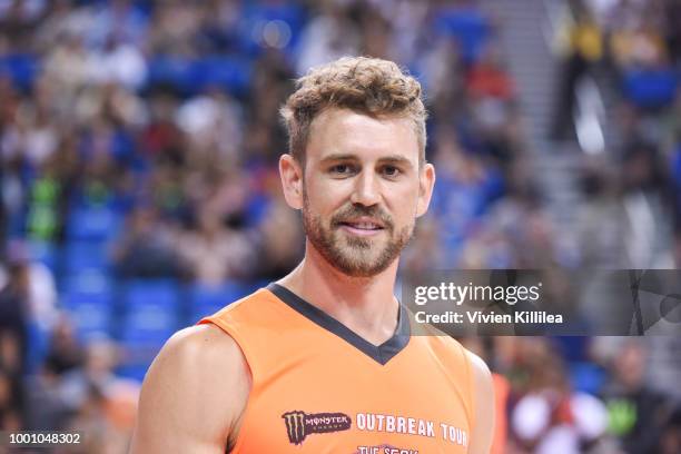 Nick Viall plays basketball at Monster Energy Outbreak Presents $50K Charity Challenge Celebrity Basketball Game at UCLA's Pauley Pavilion on July...