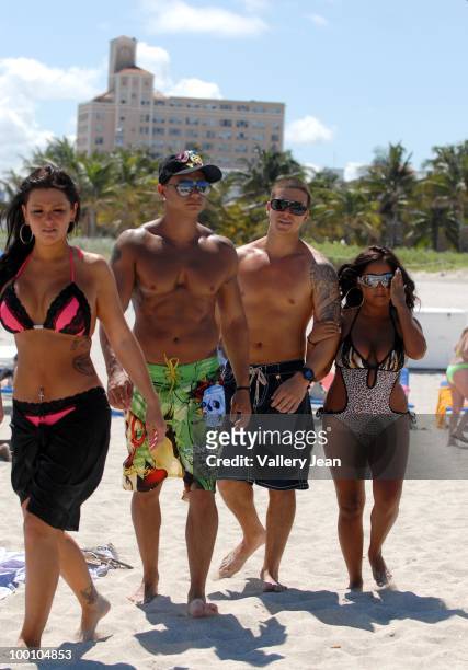 Television personalities Jenni "JWoww" Farley, Paul "Pauly D" DelVecchio, Vinny Guadagnino and Nicole "Snooki" Polizzi visit the beach on May 20,...