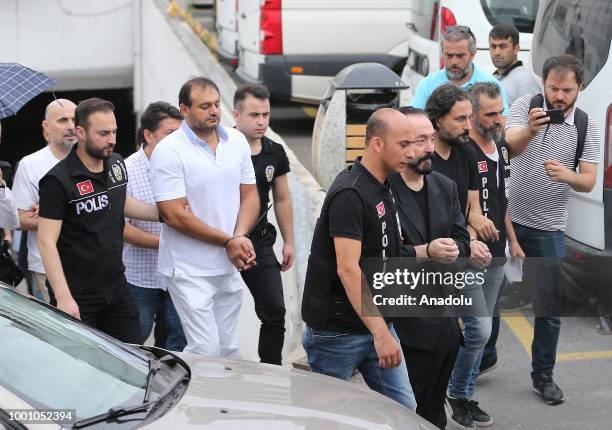 Televangelist Adnan Oktar and other suspects are brought to the Haseki Training and Research Hospital May 29 Additional Service Building in order to...