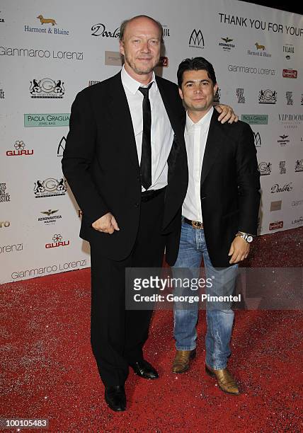 Director Paul Haggis and Oscar Generale attend the Artists for Peace and Justice Fundraiser at the VIP Room, Palm Beach during the 63rd Annual...