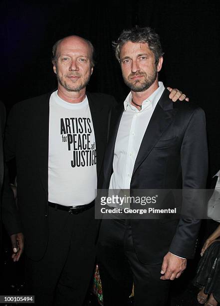 Director Paul Haggis and actor Gerard Butler attend the Artists for Peace and Justice Fundraiser at the VIP Room, Palm Beach during the 63rd Annual...