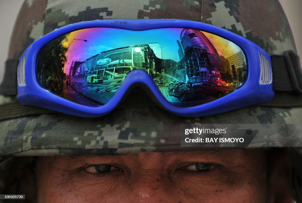 The reflection on a Thai army soldier's