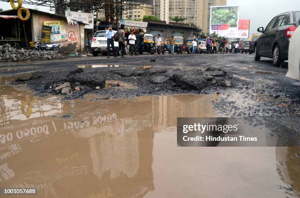 Bhiwandi bypass potholes filling by paver block in Kalyan, on July 17, 2018 in Mumbai, India. The potholed roads in Mumbai and its surrounding areas...