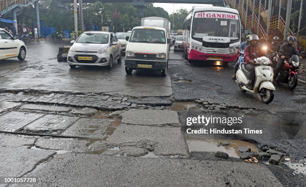 Huge Potholes on Jogeshwari- Vikhroli Link Road at Jogeshwari, on July 17, 2018 in Mumbai, India. The potholed roads in Mumbai and its surrounding...