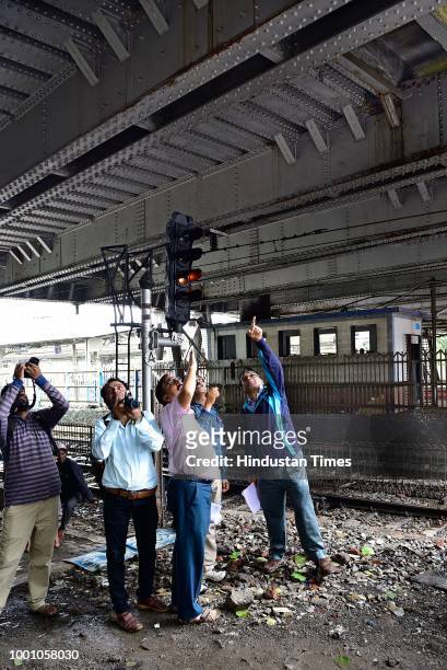 Teams of experts from IIT-Bombay, along with engineers of railways and BMC conducting safety audit of ROB at Dadar, on July 17, 2018 in Mumbai,...