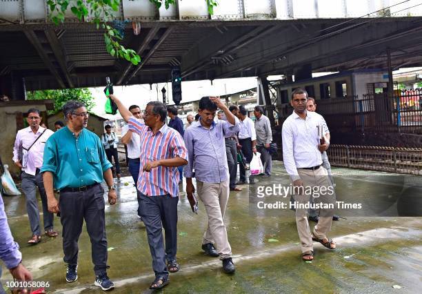 Teams of experts from IIT-Bombay, along with engineers of railways and BMC conducting safety audit of ROB at Dadar, on July 17, 2018 in Mumbai,...