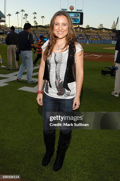 Singer Britney Christian poses prior to singing The National Anthem prior to the game between the Los Angeles Dodgers and the San Diego Padres at...