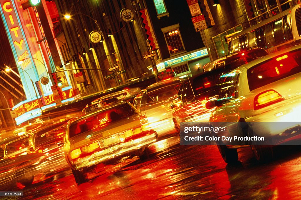 CITY TRAFFIC AT NIGHT IN NEW YORK IN BLUR