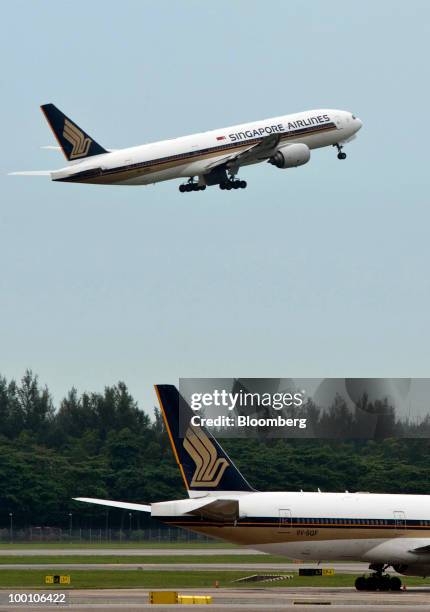 Singapore Airlines Ltd. Aircraft takes off at Changi Airport in Singapore on Friday, May 21, 2010. Singapore Airlines Ltd. Will announce earnings...
