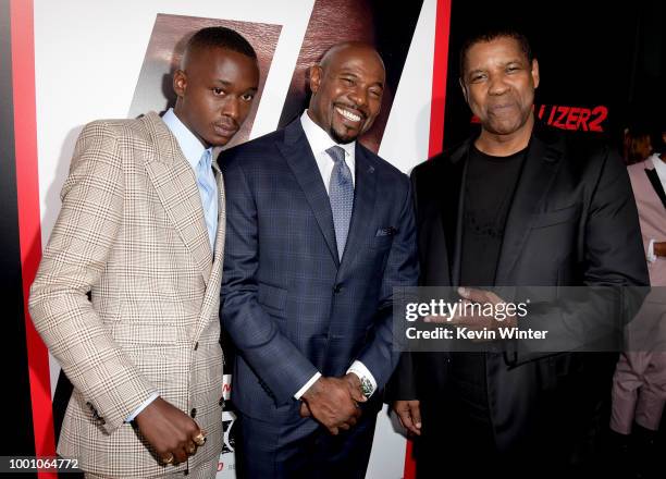 Actor Ashton Sanders, director Antoine Fuqua and actor Denzel Washington arrive at the premiere of Columbia Picture's "Equalizer 2" at the Chinese...