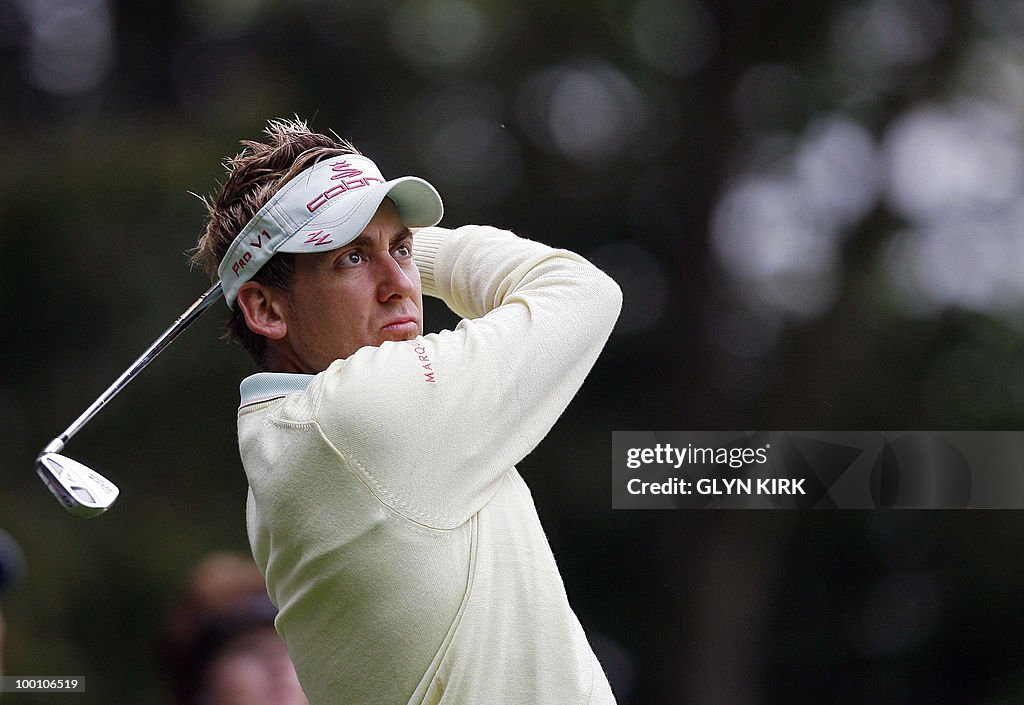 English golfer Ian Poulter watches his d