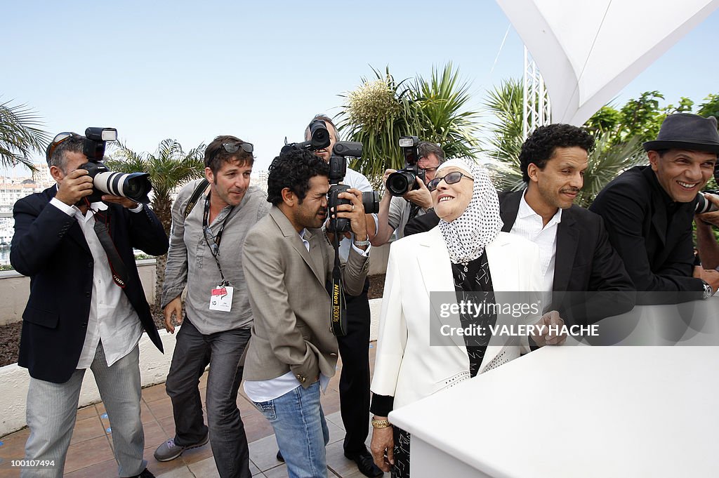 French actor Jamel Debbouze (C) pretends