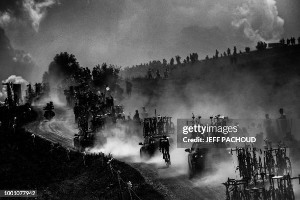 France's Fabien Grellier rides in the ascent of Plateau des Glieres during the tenth stage of the 105th edition of the Tour de France cycling race...