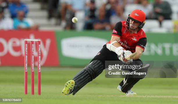 Tom Latham of Durham reverse sweeps the ball for four runs during the Vitality Blast match between Nottinghamshire Outlaws and Durham Jets at Trent...