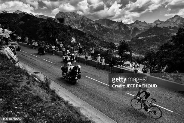 France's Lilian Calmejane rides in the ascent of the Col de Bluffy pass during the tenth stage of the 105th edition of the Tour de France cycling...