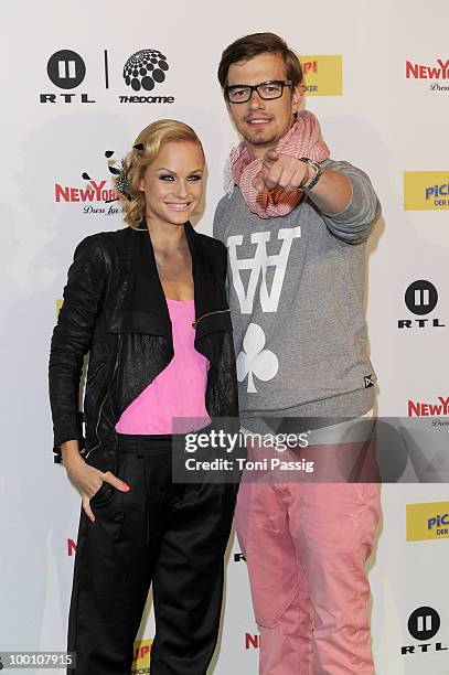 Host Mirjam Weichselbraun and tv host Joachim 'Joko' Winterscheidt arrive at 'The Dome 54' at Schleyerhalle on May 20, 2010 in Stuttgart, Germany.