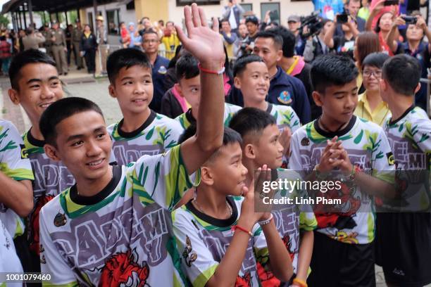 Adul Sam-on , the stateless boy who spoke to the British diver in English during their rescue, arrive for a press conference with eleven other boys...